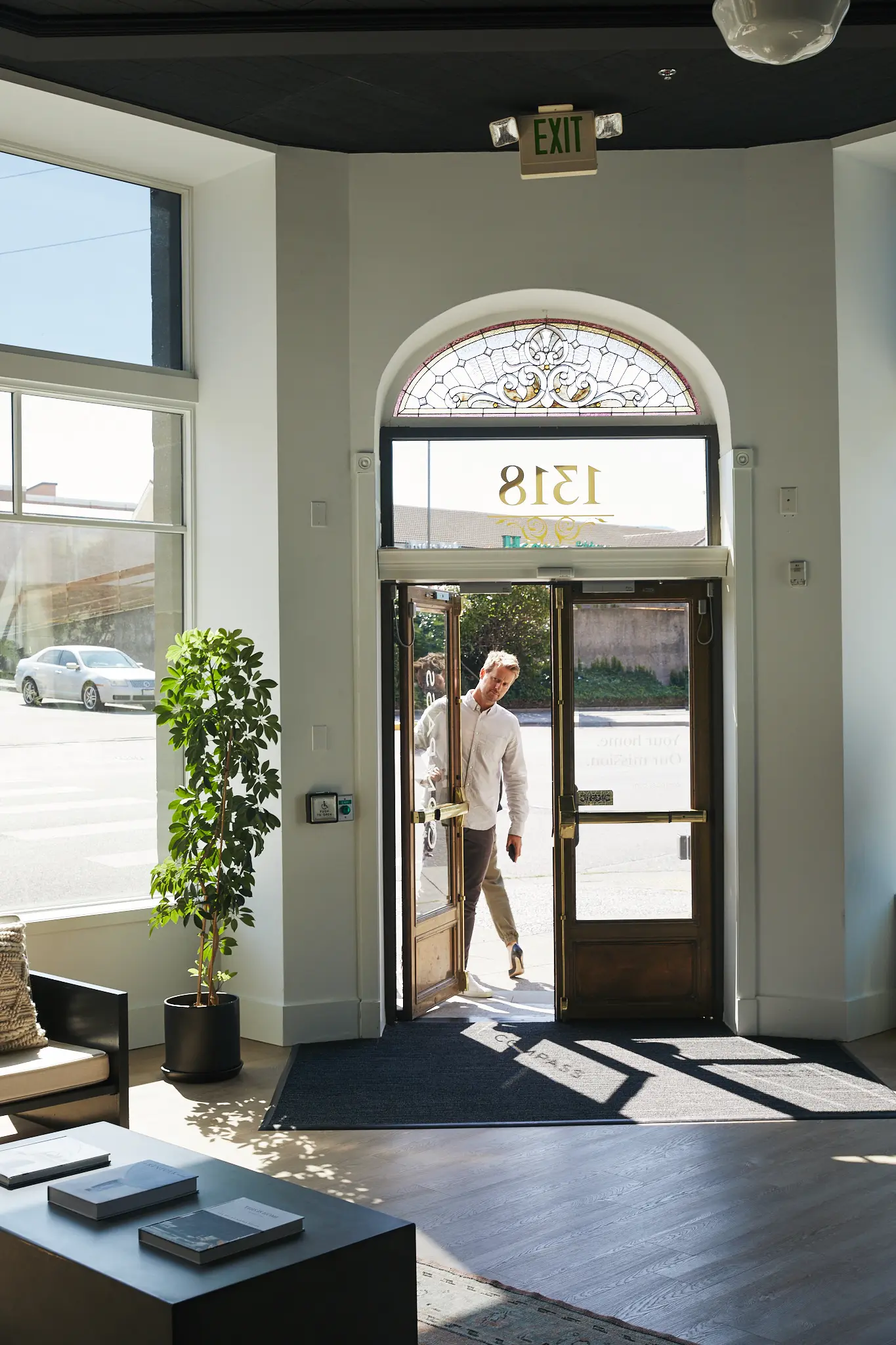 The arched front door of the office at 1318 12th Street, from inside
